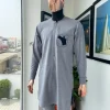 A Baba blue, gun-detailed patch pocket African traditional senator kaftan native.