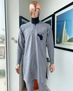 A Baba blue, gun-detailed patch pocket African traditional senator kaftan native.