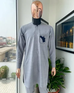 A Baba blue, gun-detailed patch pocket African traditional senator kaftan native.