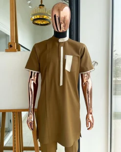 A bishop neck, Peanut and almond cream mix, clear view Swarovski button with layered flap and pocket detailing african traditional senator kaftan native.