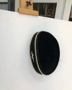 A Black and Gold Ceremonial African Traditional Hat