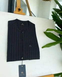 A black and plum bold stripe, black clear view Swarovski buttons, and front flap detail African traditional senator kaftan native
