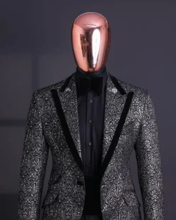 A Black and rust silver pattern jacquard, peak lapel tuxedo suit.