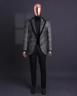 A Black and rust silver pattern jacquard, peak lapel tuxedo suit.