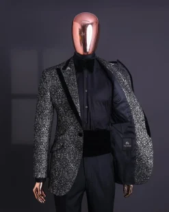 A Black and rust silver pattern jacquard, peak lapel tuxedo suit.