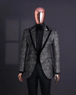 A Black and rust silver pattern jacquard, peak lapel tuxedo suit.