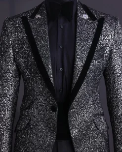 A Black and rust silver pattern jacquard, peak lapel tuxedo suit.