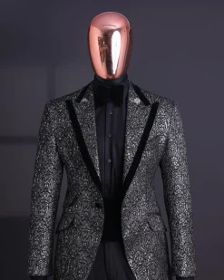A Black and rust silver pattern jacquard, peak lapel tuxedo suit.