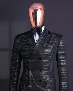 A Black and silver broom metallic scratch pattern jacquard, peak lapel tuxedo, tapered shoulder, double breasted suit