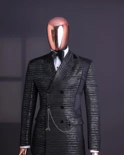 A Black and silver broom metallic scratch pattern jacquard, peak lapel tuxedo, tapered shoulder, double breasted suit