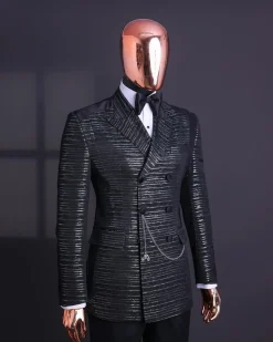 A Black and silver broom metallic scratch pattern jacquard, peak lapel tuxedo, tapered shoulder, double breasted suit