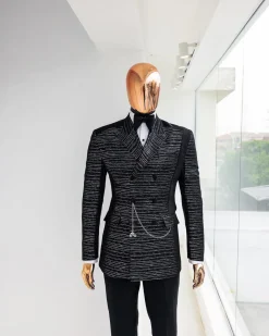 A Black and silver broom metallic scratch pattern jacquard, peak lapel tuxedo, tapered shoulder, double breasted suit