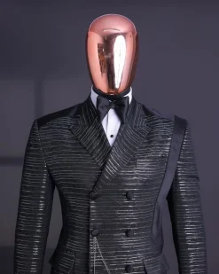 A Black and silver broom metallic scratch pattern jacquard, peak lapel tuxedo, tapered shoulder, double breasted suit