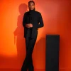 A black, covered neck shirt.