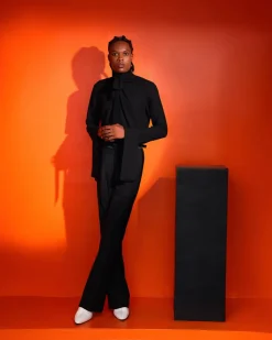 A black, covered neck shirt.