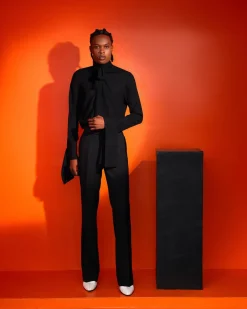 A black, covered neck shirt.