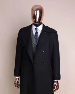 A black wool trench jacket, Cloud Grey, knitted, peak lapel jorgecarli vogue suit