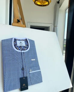 A blue and white windowpane check, front flap details African traditional senator kaftan native.