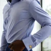 A Blue Oxford Business Shirt.