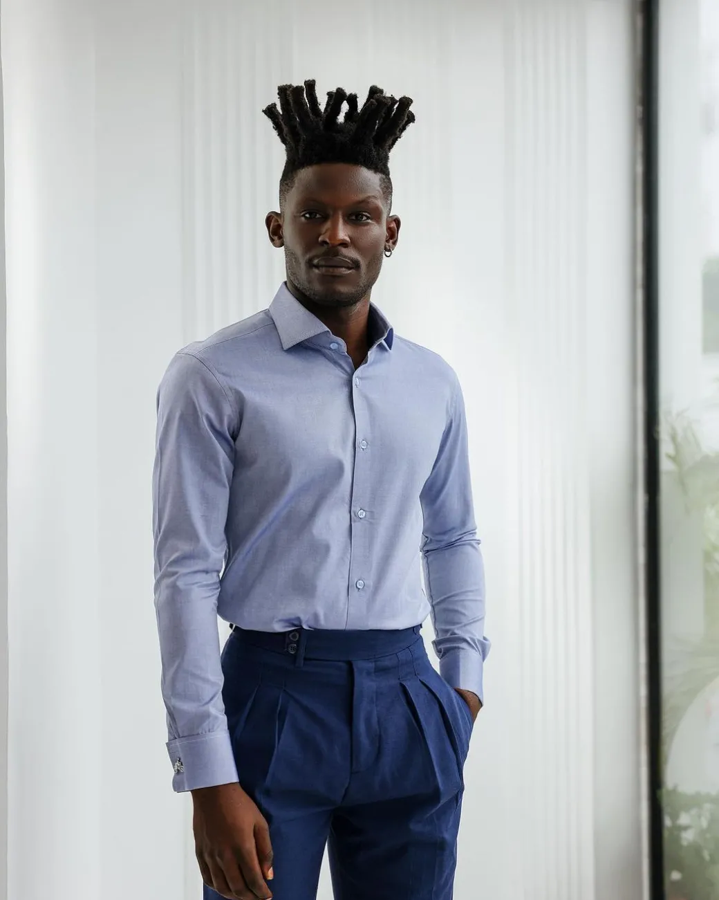 A Blue Oxford Business Shirt.