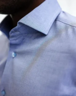 A Blue Oxford Business Shirt.