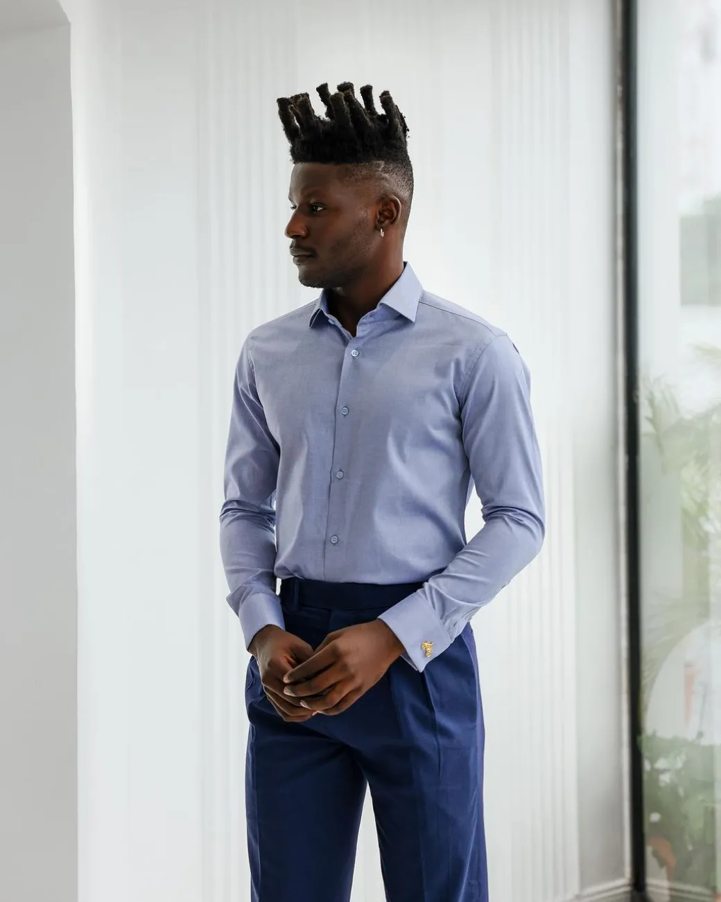 A Blue Oxford Business Shirt.