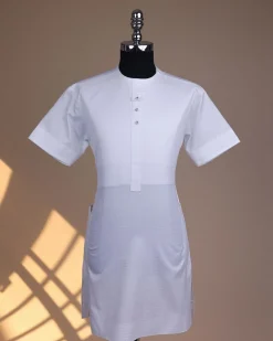A bright white, front flap with Swarovski button, invisible zip line neck details, short sleeve African kaftan