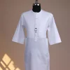 A Bright white, front flap with Swarovski button & metal tag details, 3/4 sleeve African kaftan
