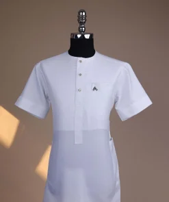 A bright white, tiny square pattern, front flap with gold Swarovski button, 3/4 sleeve African kaftan.
