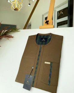A brown African kaftan with a lining divisional design and Sokoto