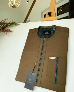 A brown African kaftan with a lining divisional design and Sokoto