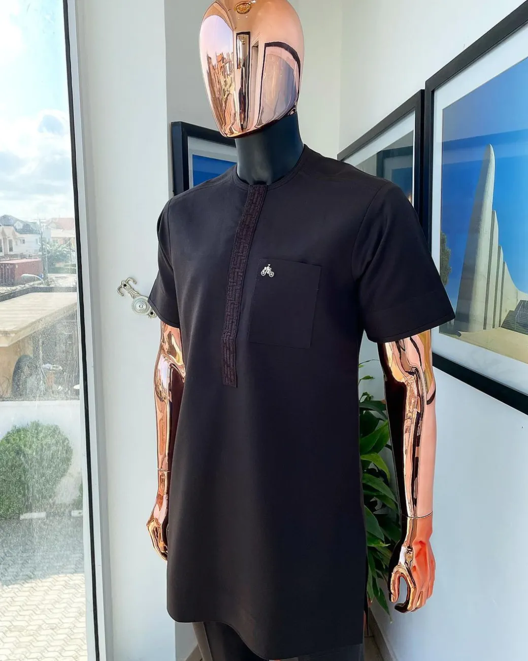 A brown front flap with embroidery details African traditional kaftan native