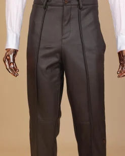 A brown leather, knitted & outer layered pant Trouser with side opening.