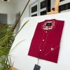 A Burgundy African Kaftan with silver Swarovski buttons, paisley detailing and sokoto