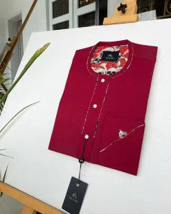 A Burgundy African Kaftan with silver Swarovski buttons, paisley detailing and sokoto
