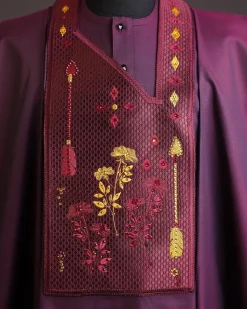 A Burgundy, arrow & floral metallic wire embroidery design silver Swarovski stone details agbada