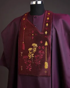 A Burgundy, arrow & floral metallic wire embroidery design silver Swarovski stone details agbada