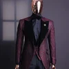 A burgundy, black broom splashed metallic jacquard, knitted, peak lapel tuxedo suit