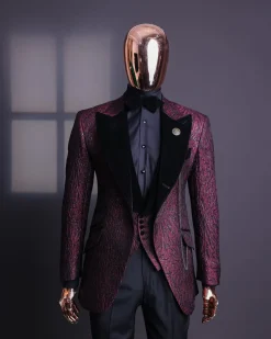 A burgundy, black broom splashed metallic jacquard, knitted, peak lapel tuxedo suit