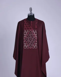 A burgundy, Connected inverted cube -layered 3D embroidery design with splashed burgundy ss30 Swarovski stone details Agbada