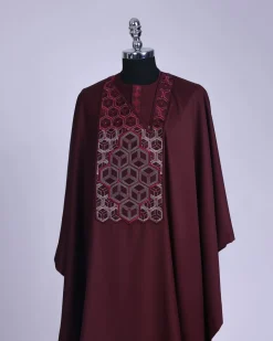 A burgundy, Connected inverted cube -layered 3D embroidery design with splashed burgundy ss30 Swarovski stone details Agbada