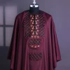 A Burgundy, Connected Ring With Gold Eyelet Details Agbada