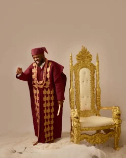 A Burgundy, deltagbada flapper embroidery details agbada