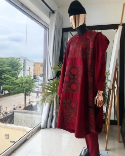 A burgundy metallic embroidery Agbada with black mixed jacquard, Swarovski burgundy stone detailing