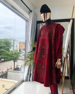 A burgundy metallic embroidery Agbada with black mixed jacquard, Swarovski burgundy stone detailing