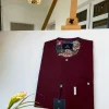A Burgundy with a clear Swarovski button front flap African Kaftan