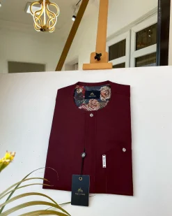 A Burgundy with a clear Swarovski button front flap African Kaftan