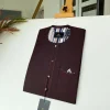 A burgundy with Swarovski button details African kaftan