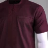 A Burgundy, zip line with arewa embroidery, shirt sleeve African senator kaftan native.