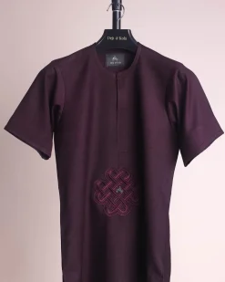 A burgundy, zipline with lower embroidery details, short sleeve African senator kaftan native.